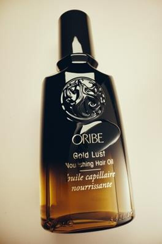 Oribe Gold Lust Nourishing Hair Oil — flaska i glas och guld